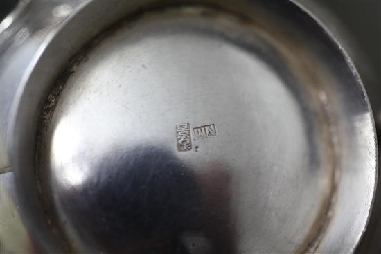 A Chinese four piece silver tea set,